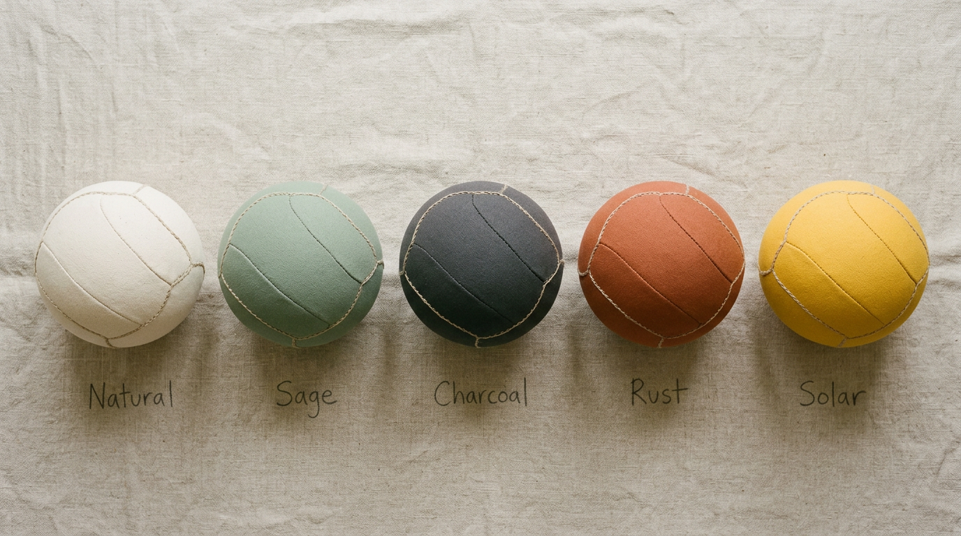 Five handcrafted canvas balls in Natural, Sage, Charcoal, Rust, and Solar